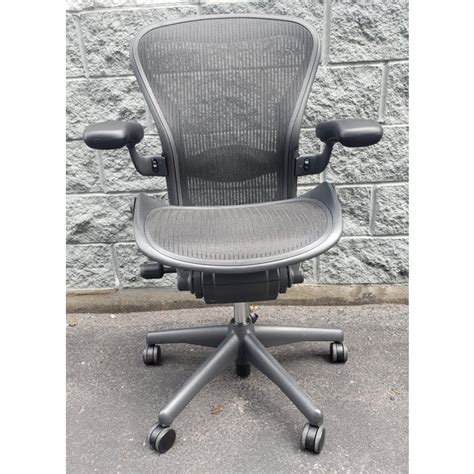 herman miller fake chair - original Herman Miller chair.